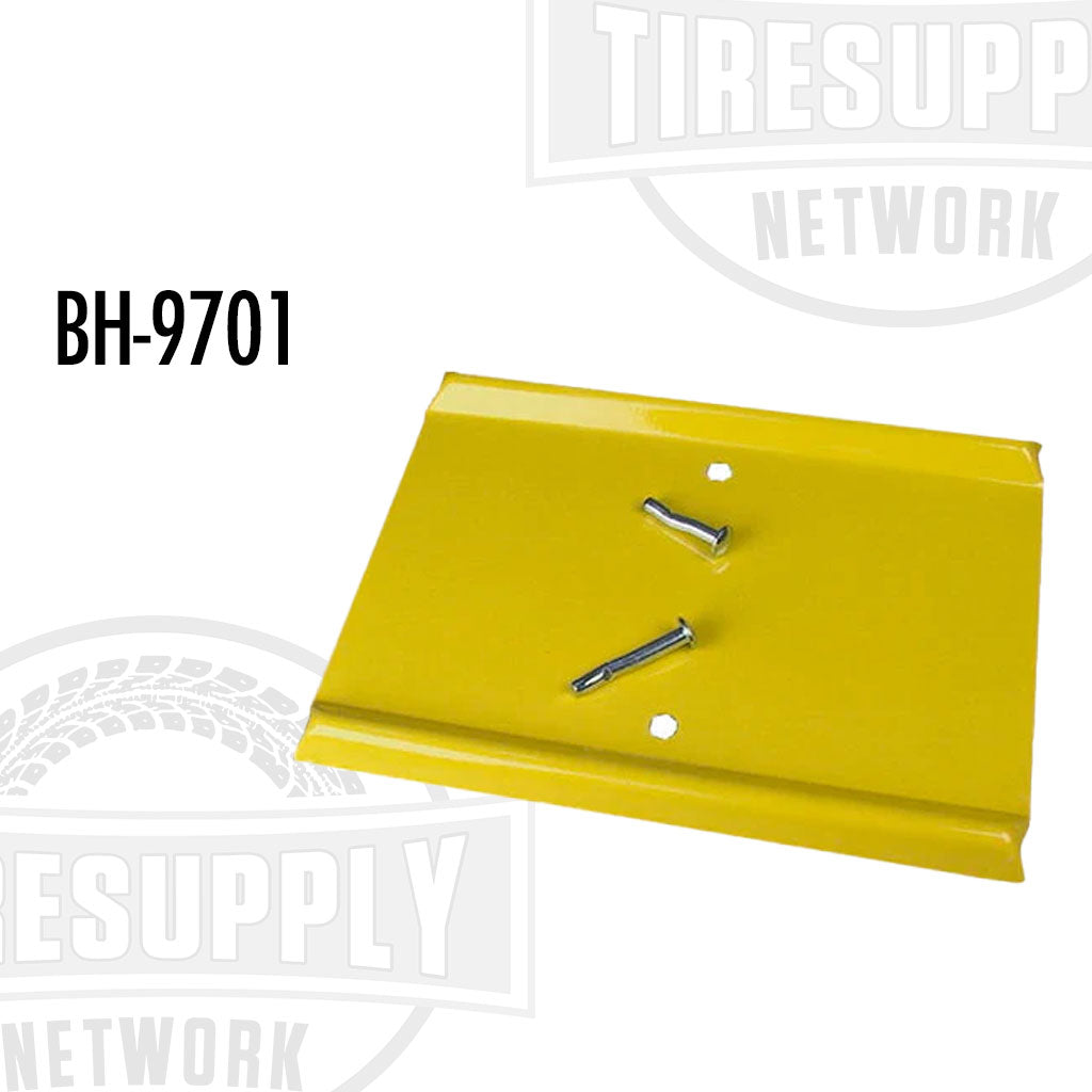 Yellow metal spotter dish with two bolts, used for vehicle maintenance. BH-9701