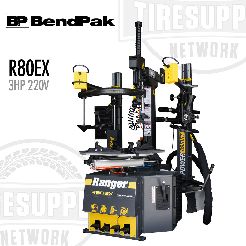 BendPak Ranger R80EX Tilt Back Dual-Tower Assist Tire Changer, black and yellow in color with multiple tools and a 3 HP 220V motor.