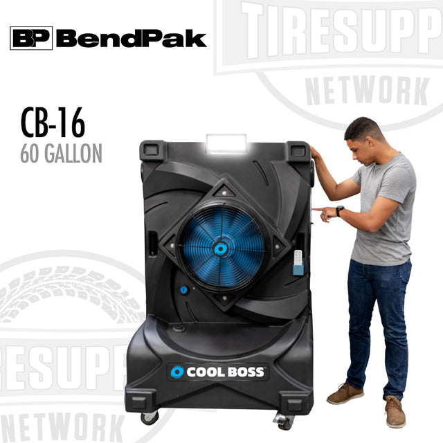 A man demonstrating the use of the BendPak Cool Boss CB-16 portable air cooler with a 60-gallon reservoir. The cooler is black with blue fan blades and has LED lighting.