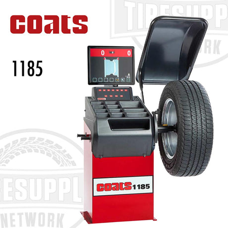 Coats 1185 Compact Space-Saver Wheel Balancer with an LCD video display, positioned on a white background with a tire mounted on it, and the Coats brand visible.