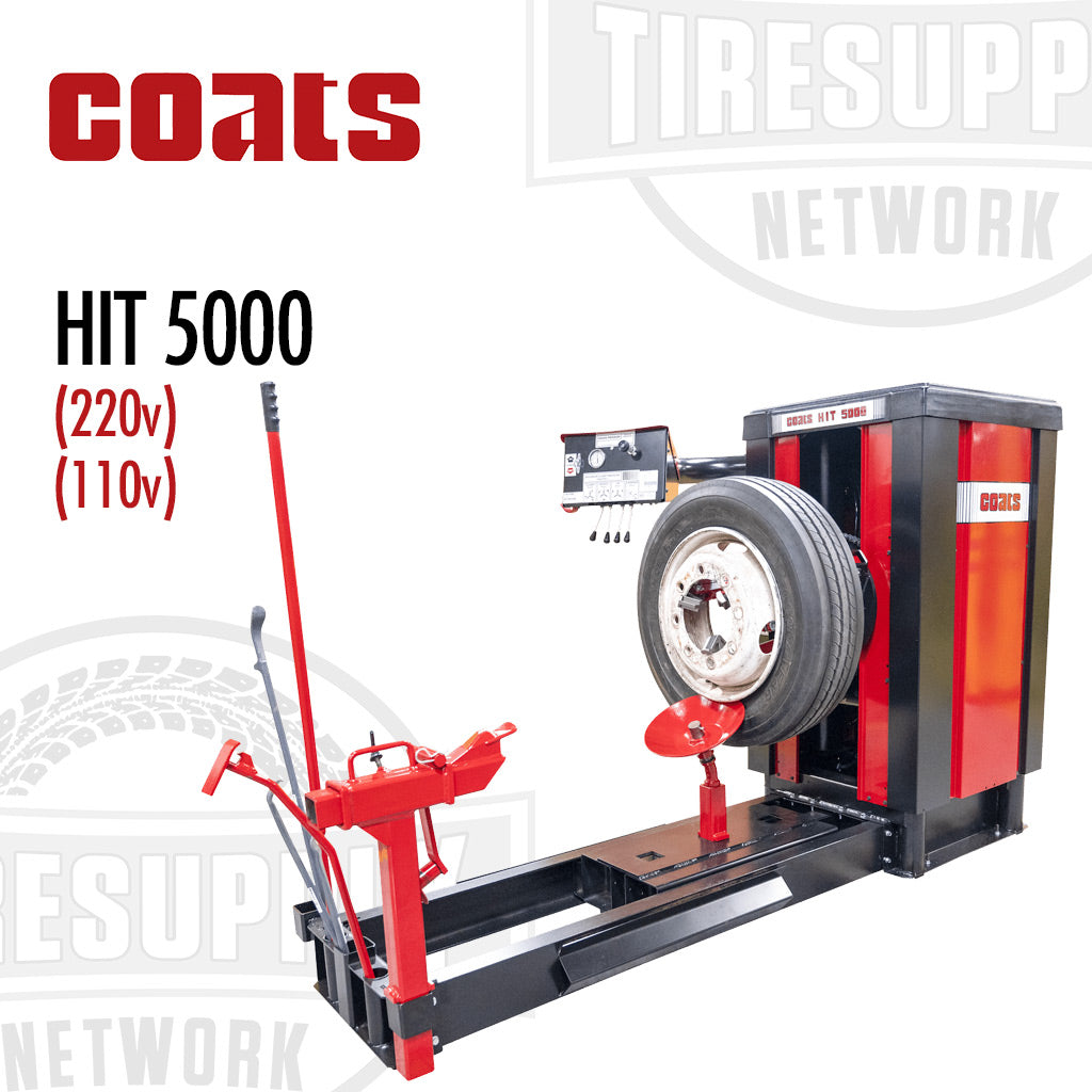 Coats HIT 5000 Heavy Duty Tire Changer with Independent Hook & Roller. The equipment is black and red in color, with a large swing arm, control panel, and a mounted tire on the changer.