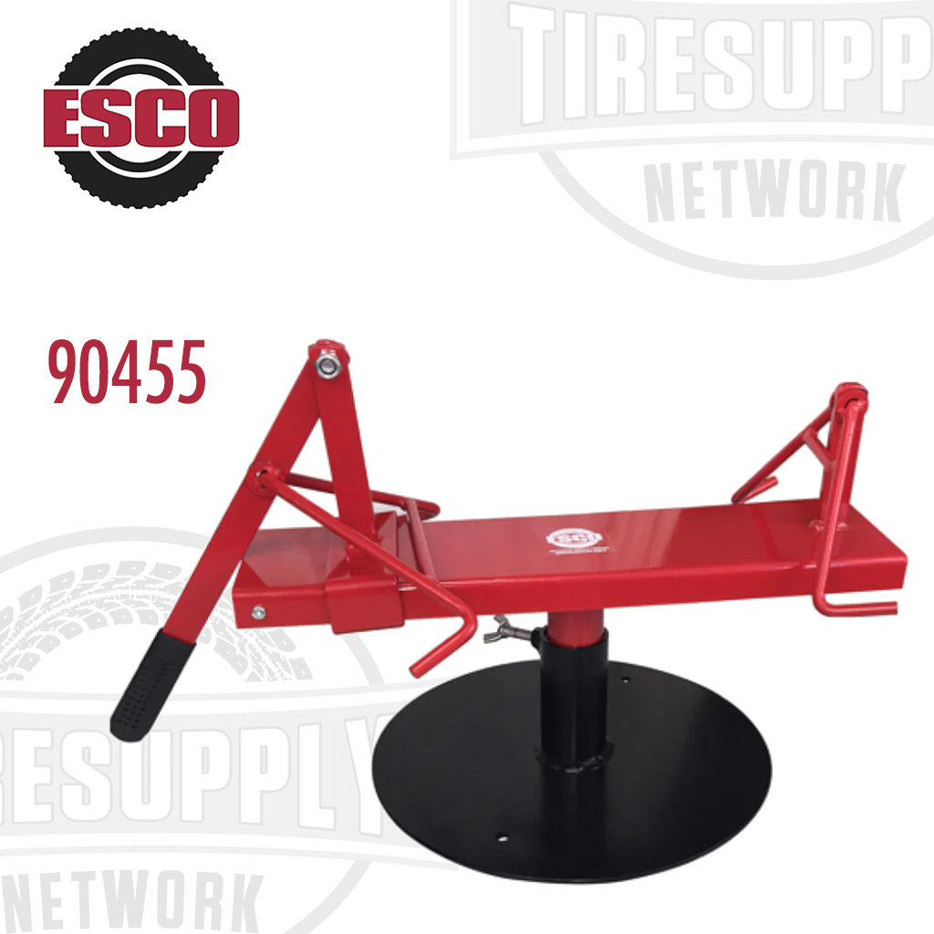 A red ESCO manual tire spreader with a mounting base, designed for use with passenger tires. 90455