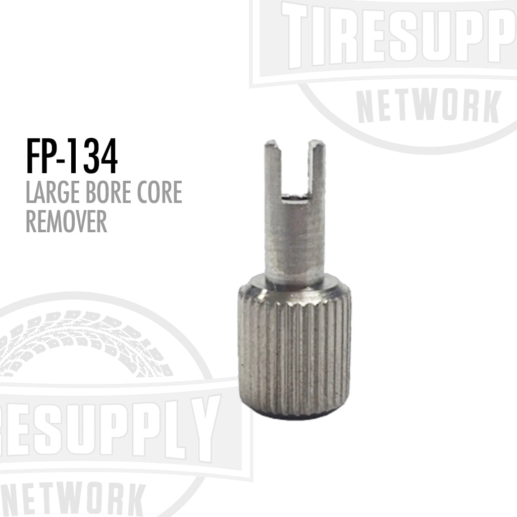 A silver-colored metal core remover tool with a ribbed grip surface and a split tip designed for valve stem use. FP-134