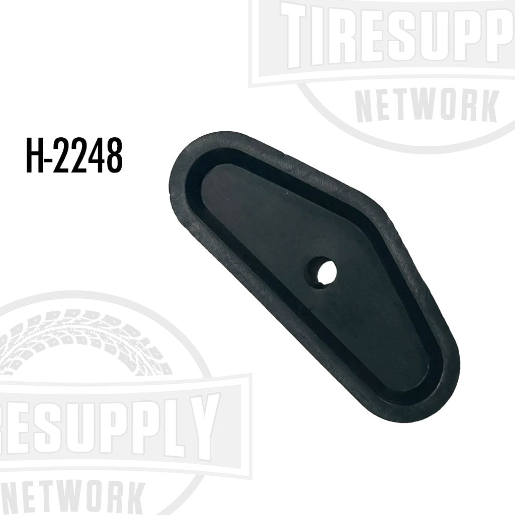 A black Haltec H-2248 inner dual tire valve stem extension stabilizer for Freightliner Alcoa wheels.