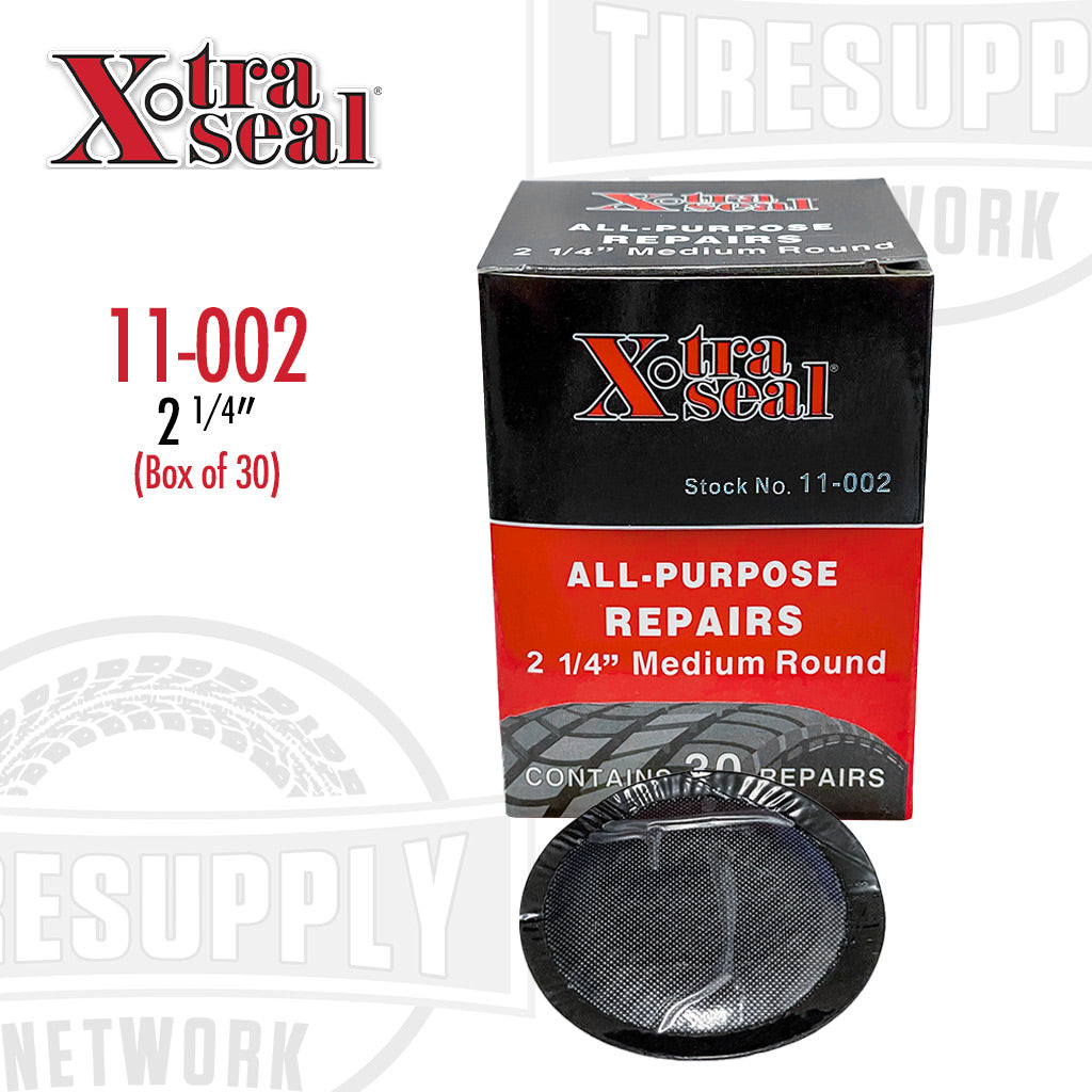 A box of Xtra Seal medium round feather-edge tube patch repair units with a visible black patch. The box is labeled for all-purpose repairs and specifies a patch diameter of 2 1/4 inches, with a note that there are 30 patches per box. 11-002