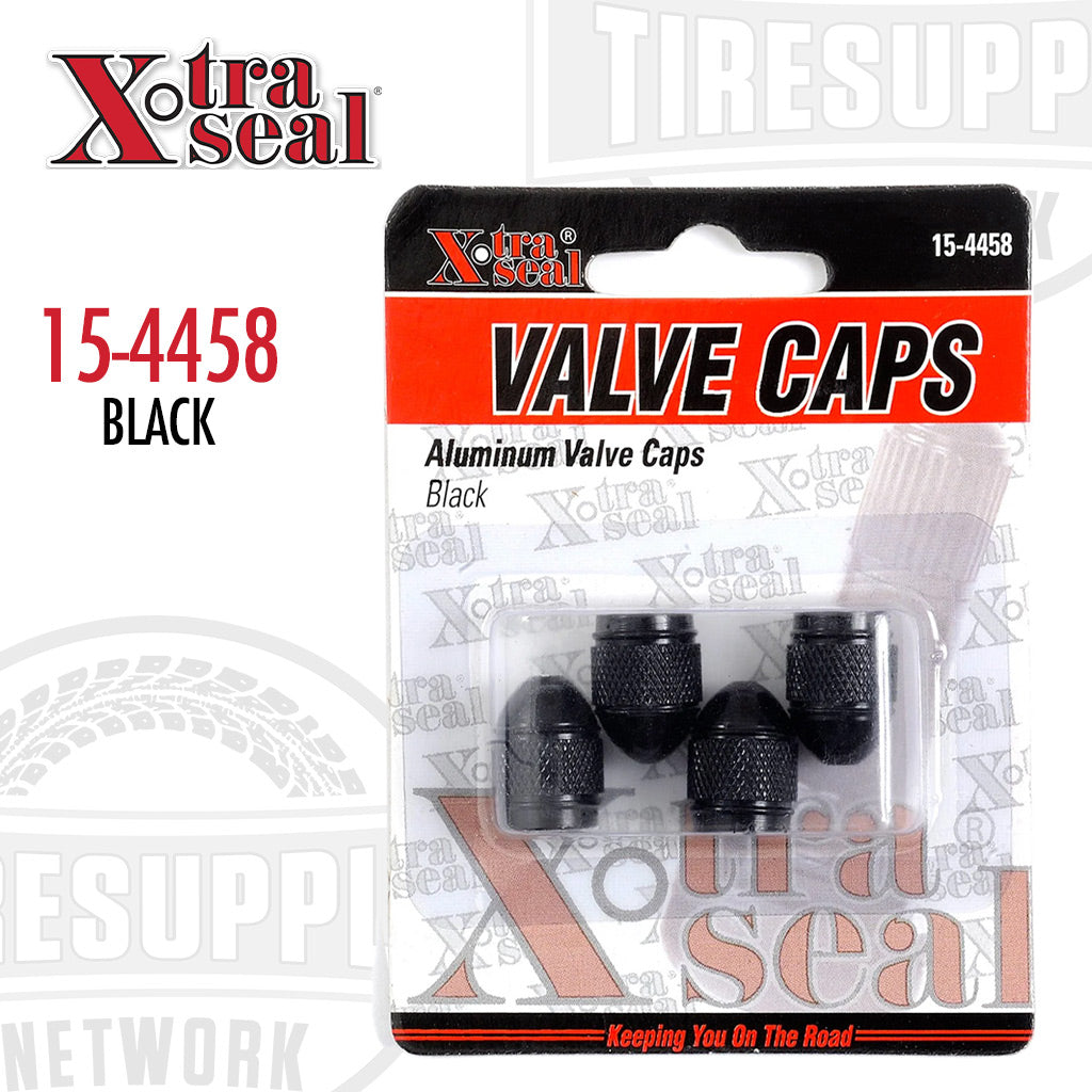 A pack of four black aluminum valve caps by Xtra Seal, displayed in a clear plastic packaging with branding and product information. 15-4458