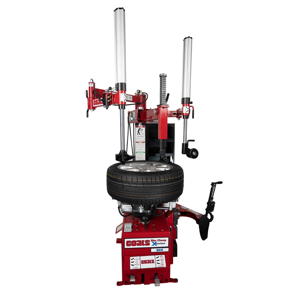 Coats 80x rim clamp tire changer with robo arm helper device, electric or air motor