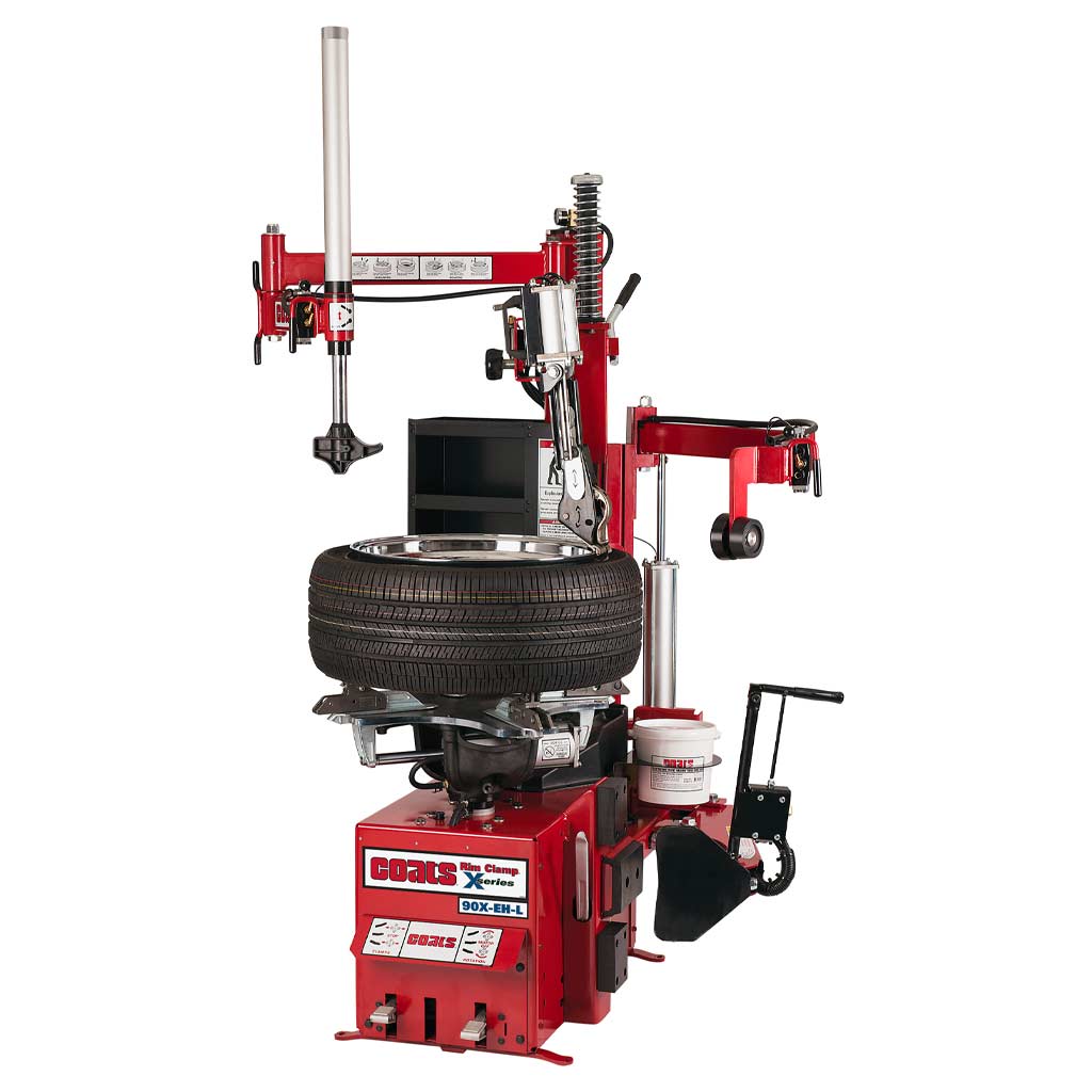 Coats 90x tire changer with robo arm helper