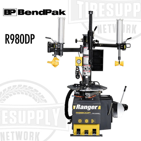 BendPak Ranger R980DP Swing Arm Dual-Tower Assist Tire Changer with black and yellow color scheme, featuring pneumatic assist arms and a high-torque electric turntable drive.