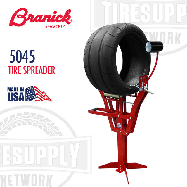 The image shows a Branick 5045 Tire Spreader, which is a tool used for tire repair. The tool is red with a black tire mounted on it, and there is a light with a bulb on an adjustable arm for illumination.