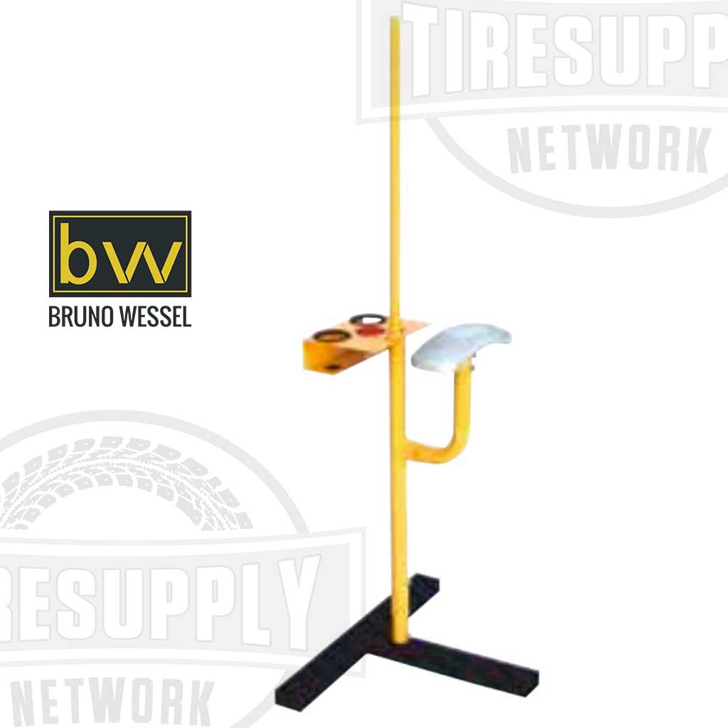 A Bruno Wessel K-5 Tire Studding Station stand in yellow and black color with a mount, support arm, holster, and cup for the studding process.