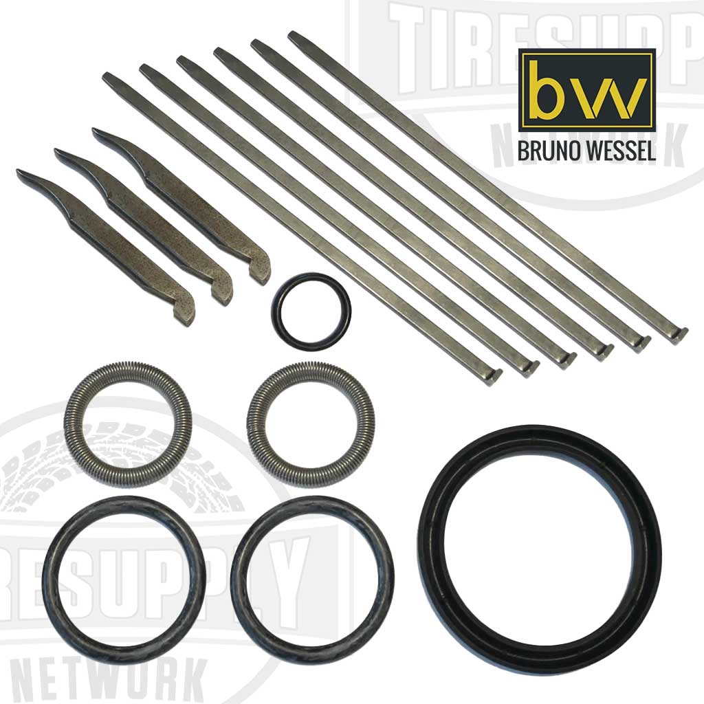 Assorted tool parts and accessories laid out on a white background, including various fingers, rings, and cups presumably for a stud gun repair kit. TSIT-8. TSIT-9. TSIT-11.