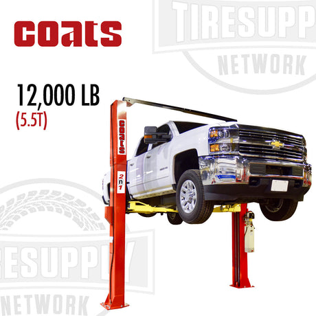 A red two-post automotive lift with a white vehicle underneath, indicating a capacity of 12,000 lbs or 5.5 tons.