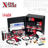 Wall-mount cabinet with full tire repair product and tool assortment, labeled with the Xtra Seal brand and product number 14-604.
